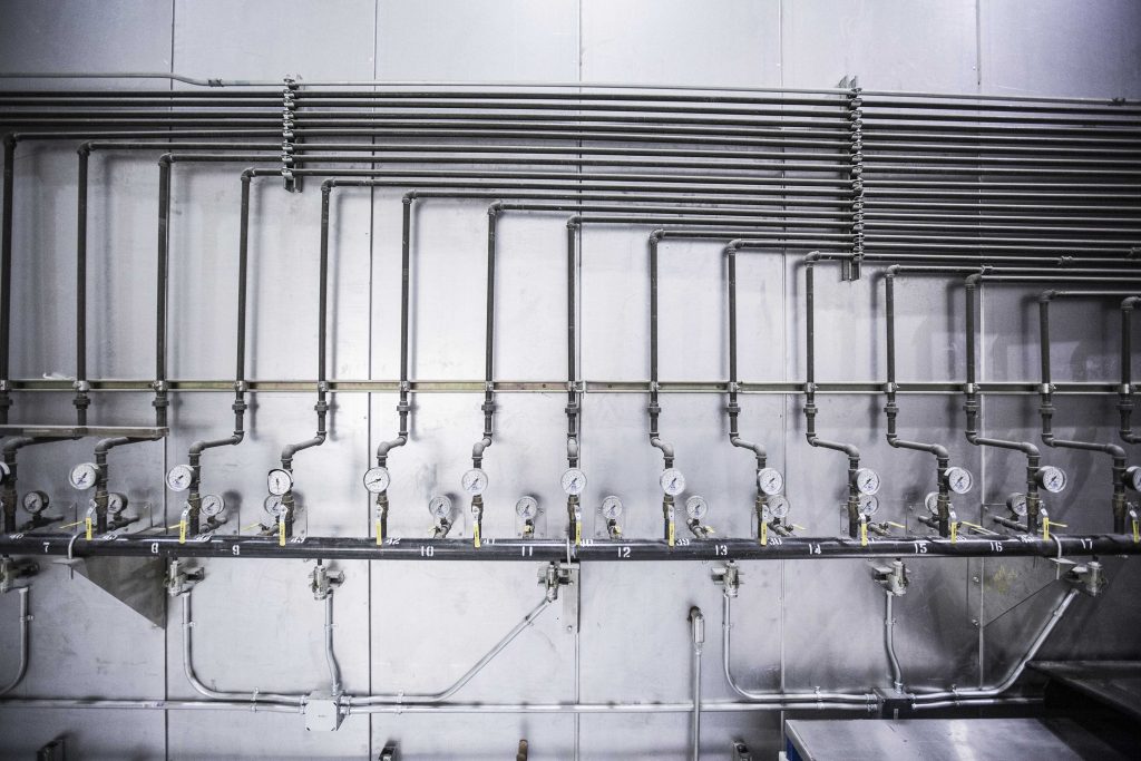 The Hidden Legionella Hazards in Building Plumbing Systems - image showing pipework and plumbing