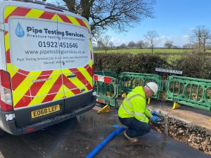 water mains chlorination - image of PTS working on pipework.