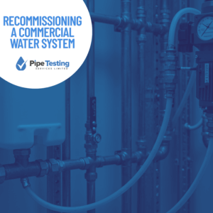A guide to recommissioning a commercial water system by Pipe Testing Services, over a background photo of a professional chemical dosing system in a plant room.